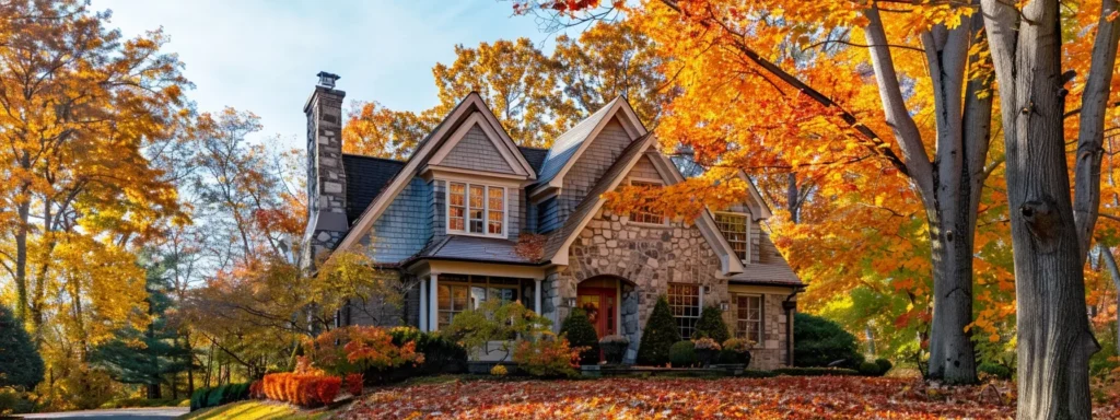 a pristine home with a well-maintained chimney stands against a backdrop of vibrant autumn foliage, symbolizing the importance of safety and investment in professional evaluations.